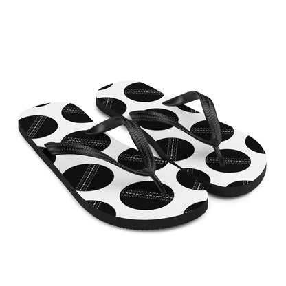 Black and white cricket ball flip flops