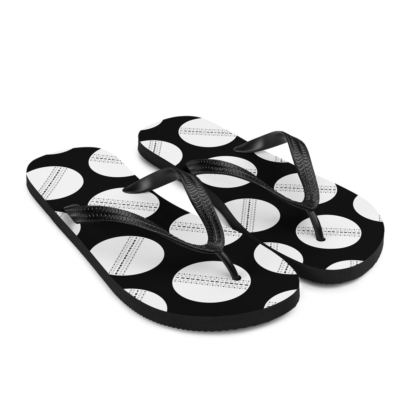 Black and white cricket ball flip flops